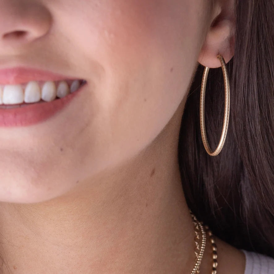oval gold 2" hoop - textured - e.newton