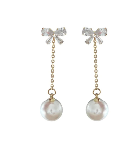 Crystal Bow and Pearl Drop Swingy Statement Earrings